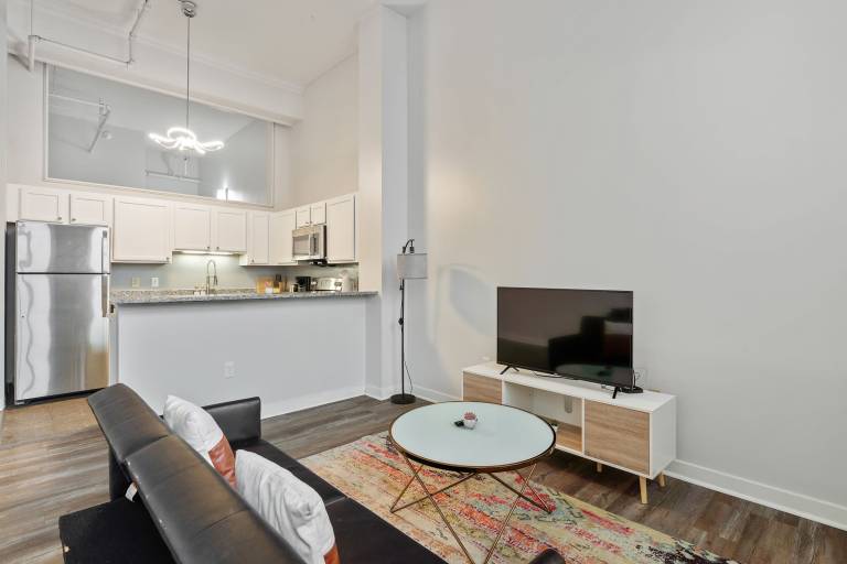 CozySuites 1BR with Direct Skybridge Access