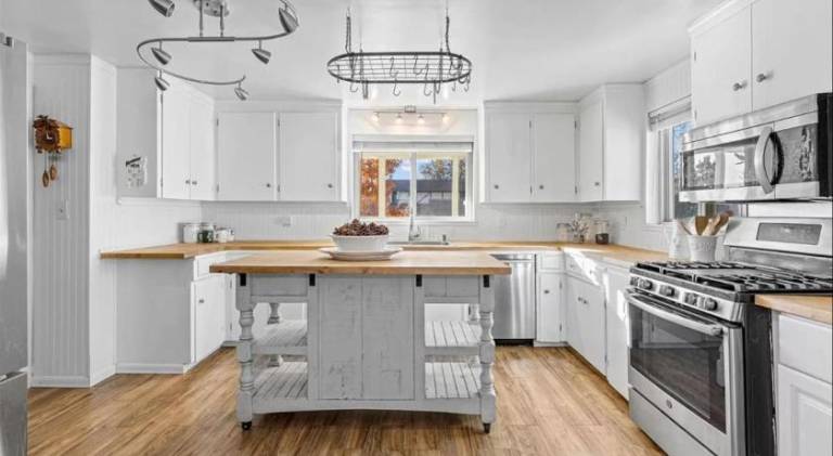Sunny Beach House of Olde Town Arvada in Wheat Ridge, CO
