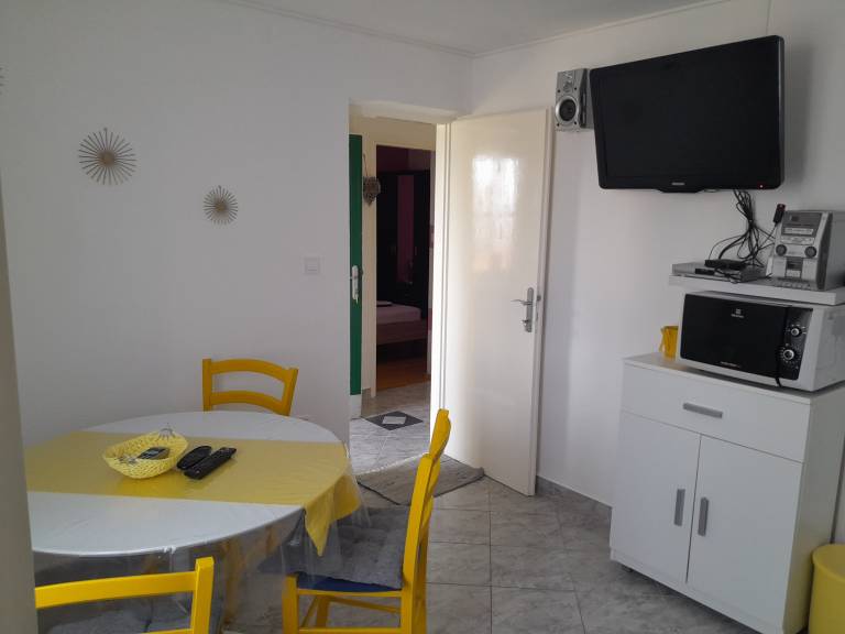 Two bedroom apartment with terrace and sea view Postira, Brač (A-2911-b) — photo 4
