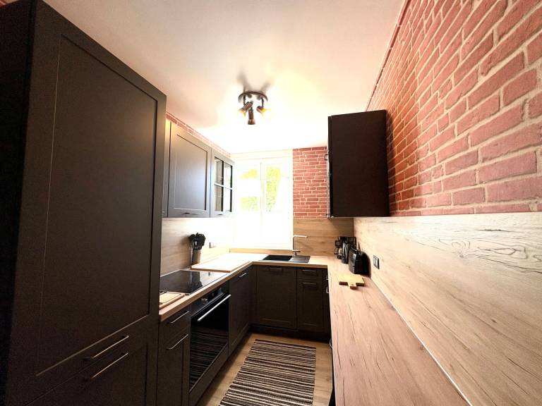 Holiday apartment with garden, patio & grill — photo 3