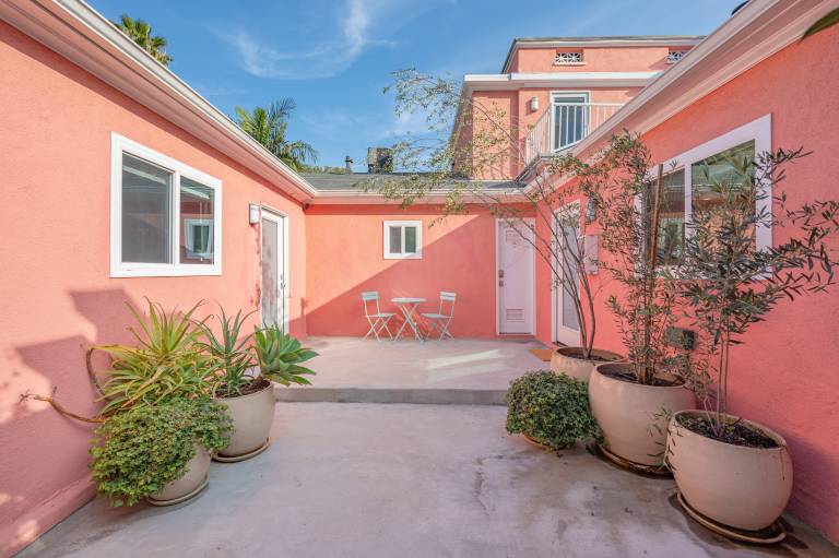 5 Units in Heart of Hollywood Remodeled Art Deco Pink Revival by AvantStay
