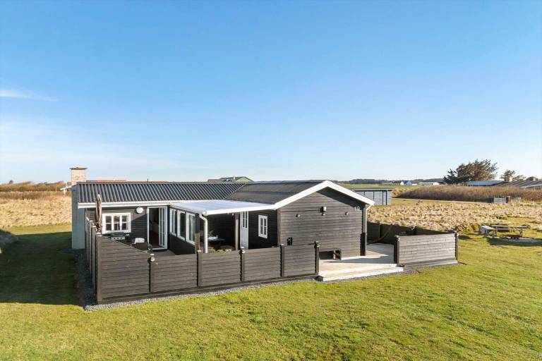 Vacation home with BBQ & terrace in Lokken