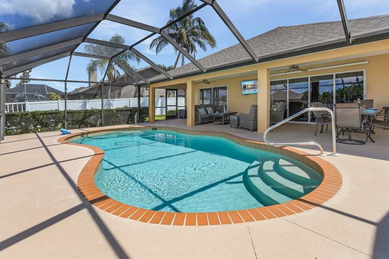 Canal home with Heated Pool - Villa Escape to the Cape - Roelens Vacations — photo 3