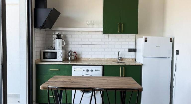 Holiday apartment with terrace & BBQ in Mugla