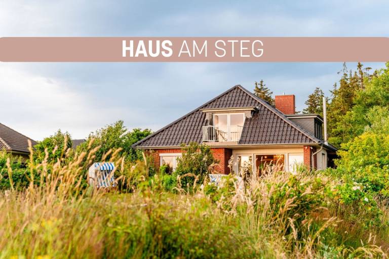 Unser Ferienhaus am Steg mit Meerblick, großem Garten und moderner Ausstattung in Husum
