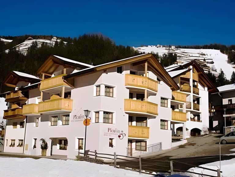 Serviced apartment with sauna & garden in Marebbe