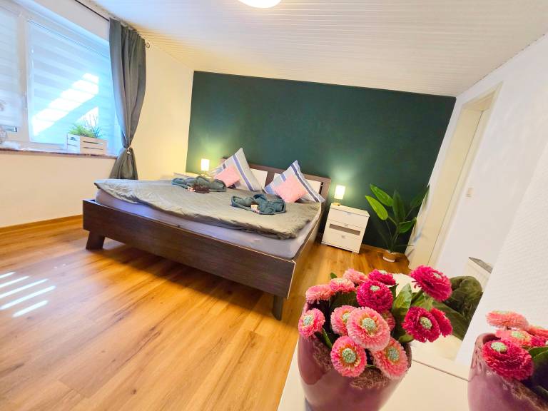 Holiday Apartment Gartenblick 50sqm with Terrace, Garden, Fireplace & Open Kitchen with Bar — photo 3