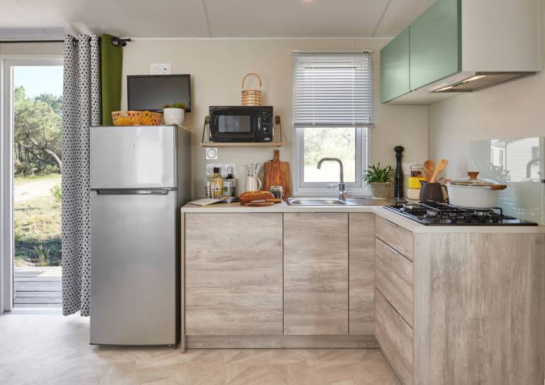 Family-friendly pleasant caravan with patio, grill & pool | Golf view | Pets are welcome — photo 3