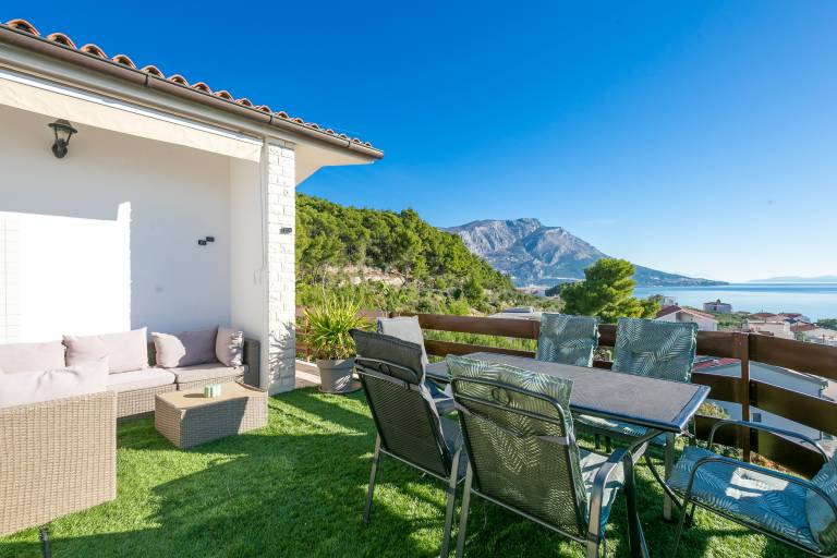 Two bedroom apartment with terrace and sea view Duće, Omiš (A-24975-c) in Omis