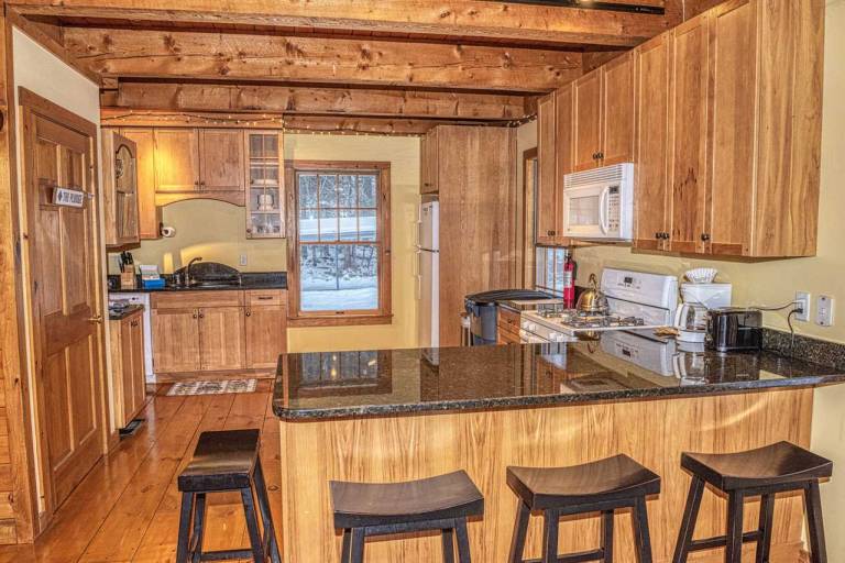 The Whimsical Chalet is a lovely cape on acres. Private setting less than 10 minutes to skiing. — photo 3