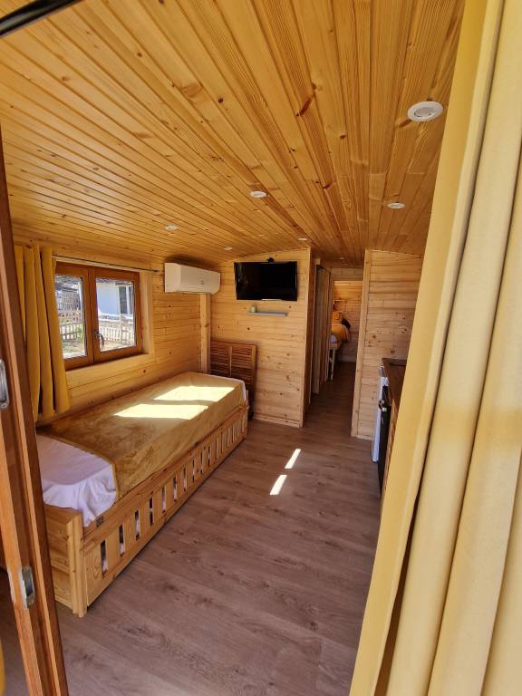 Family-oriented mobile home with yard, sauna & private pool | Pool view | Pets are welcome — photo 3