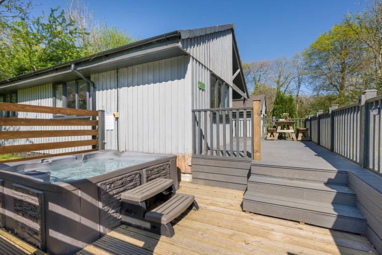 Lodge with patio, garden & hot tub | Pets allowed — photo 2