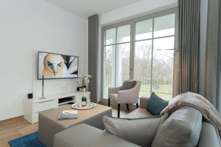 moderne Ferienwohnung mit eigener Sauna und Balkon - Villa Pauline FeWo 06 — photo 4
