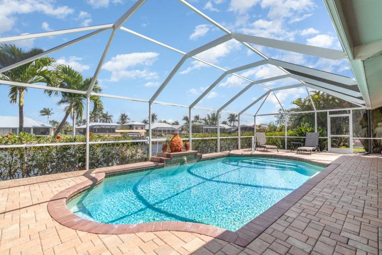 Family-oriented spacious vacation home with private pool & BBQ | Water view | Pets allowed in Cape Coral, FL