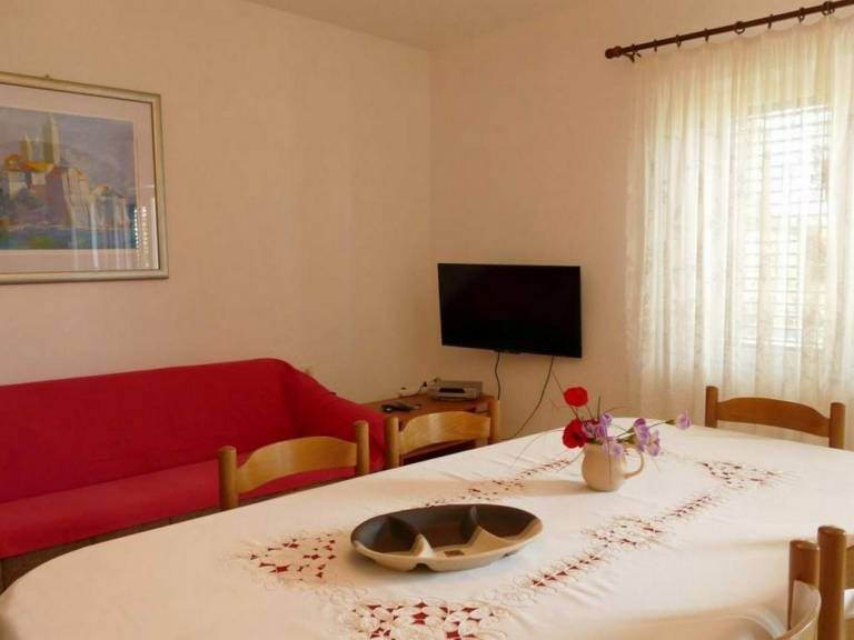 Three bedroom apartment with terrace Barbat, Rab (A-22423-a) — photo 4