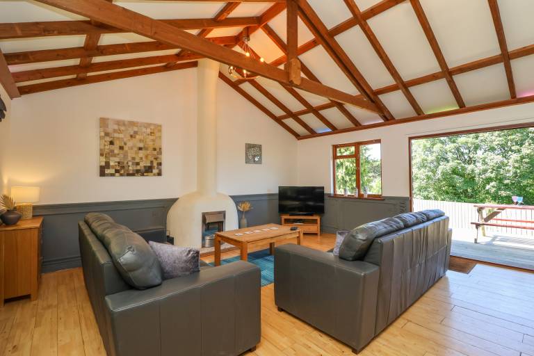 Family-oriented lovely cottage with garden & jacuzzi | Beach view | Pets are welcome — photo 3