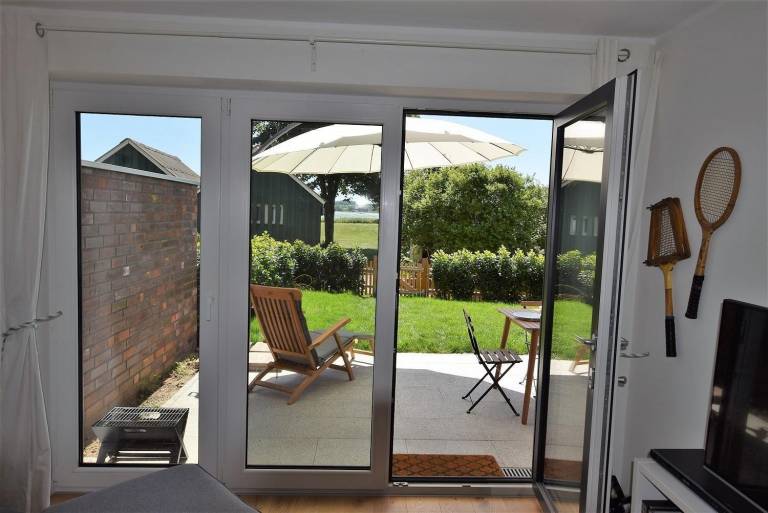 Family-oriented apartment with garden & patio | Sea view | Next to the beach | Pet-friendly — photo 3