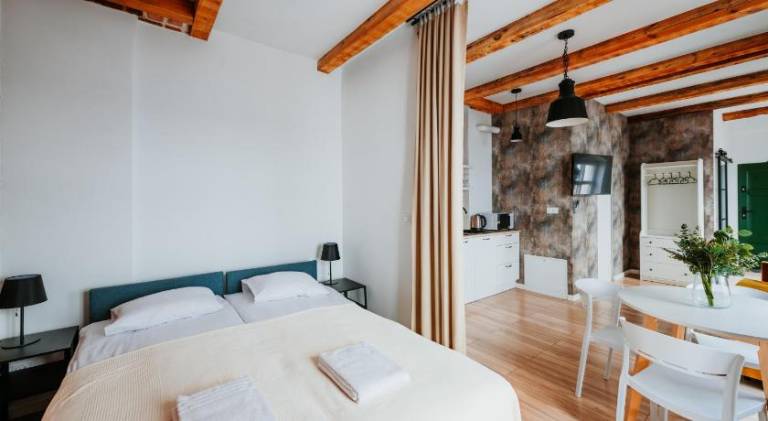 Holiday apartment with garden in Torun