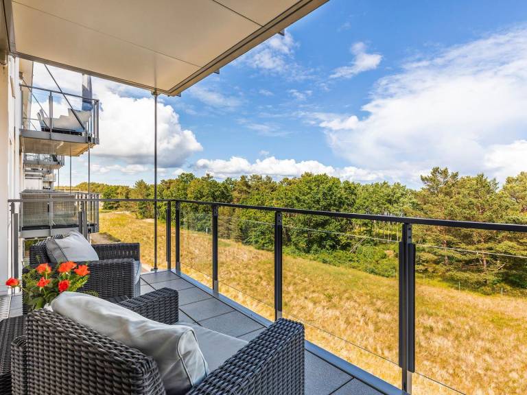 FeWo Dünenwald: Gemütliches Apartment 65 m² mit Meerblick für kleine Familien — photo 2