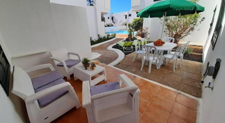 Holiday apartment with yard, private pool & patio in Tías