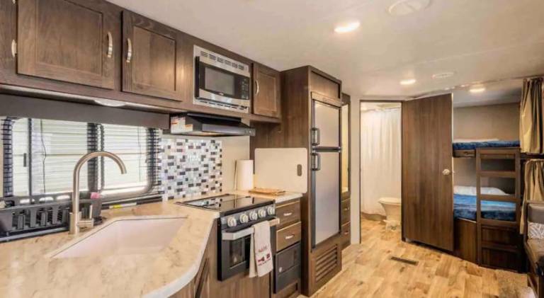 Parked RV Travel Trailer Getaway Wi-Fi with Hookups — photo 5