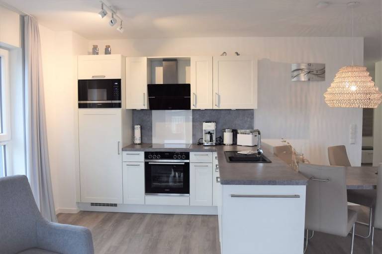 Moderne, hochwertige Ferienwohnung, Sauna, großer Balkon, Meerblick, strandnah in Wangerland