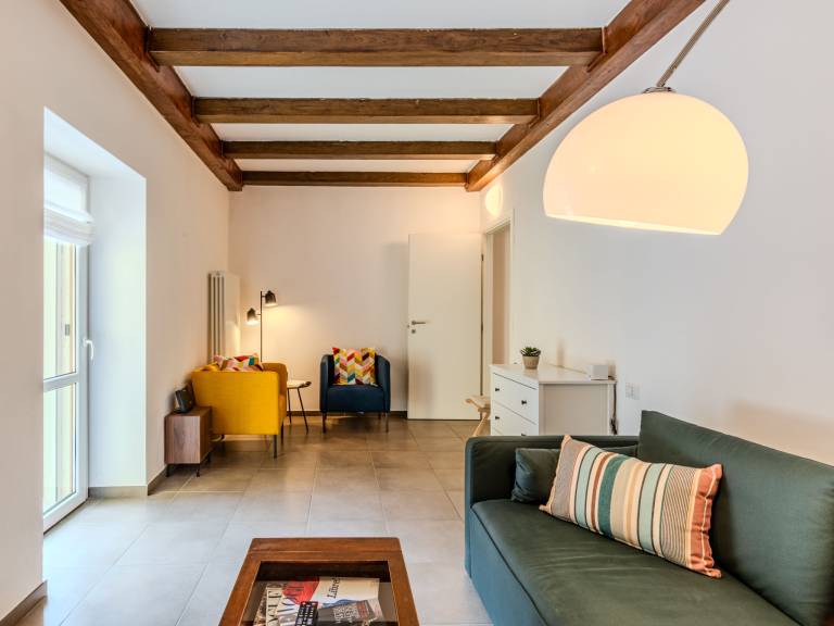 Holiday apartment with patio & garden | Mountain view in Porlezza