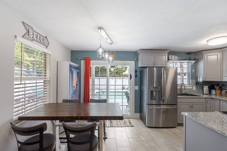 Short Walk to Beach! Private Heated Pool with Backyard Oasis! — photo 2