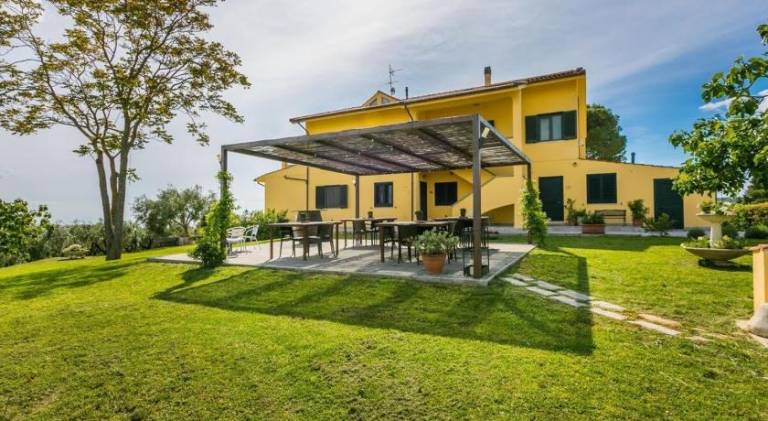 Holiday apartment with grill, yard & terrace in Rosignano Marittimo