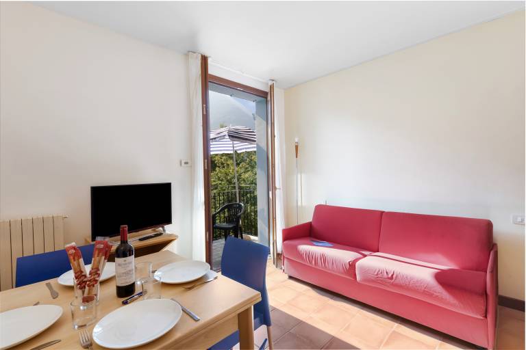 Beautiful holiday apartment with garden | Mountain view | Beach nearby | Pet-friendly in Porlezza