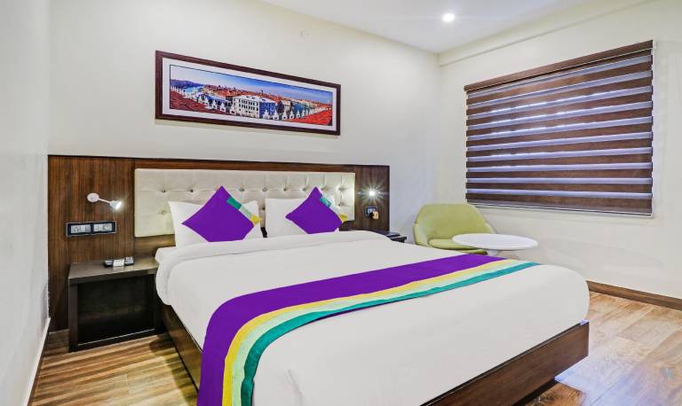 Treebo Premium Raj Vista Global Village