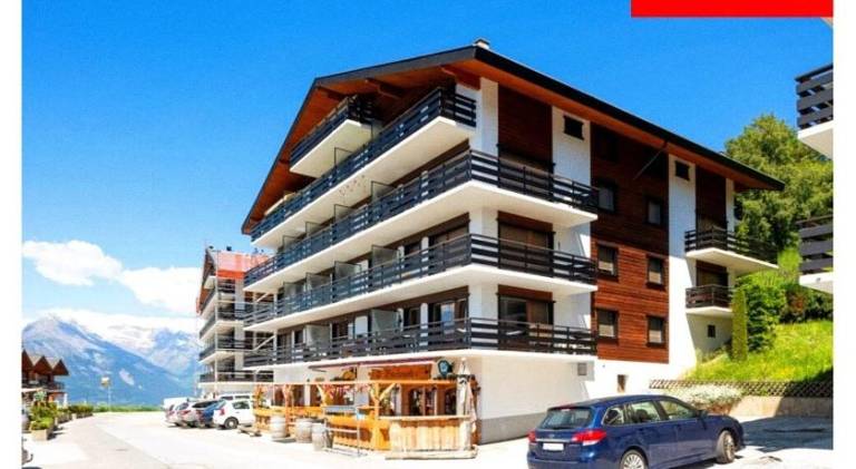 Chalet Alpin, central et parking — photo 3