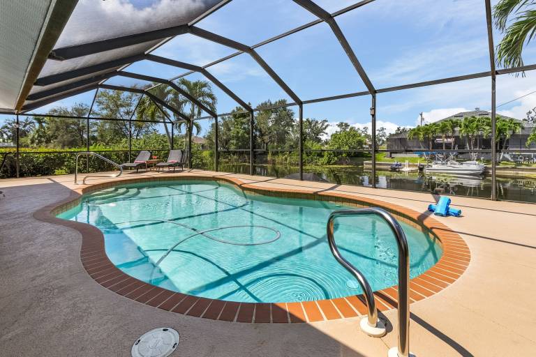 Canal home with Heated Pool - Villa Escape to the Cape - Roelens Vacations in Cape Coral, FL