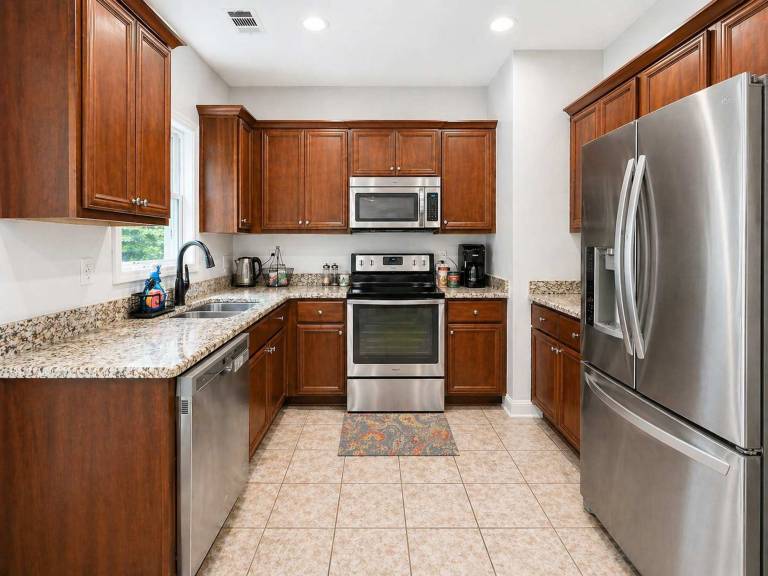 Family-oriented charming vacation home with fast internet, grill & yard | Dogs allowed in Forsyth, GA