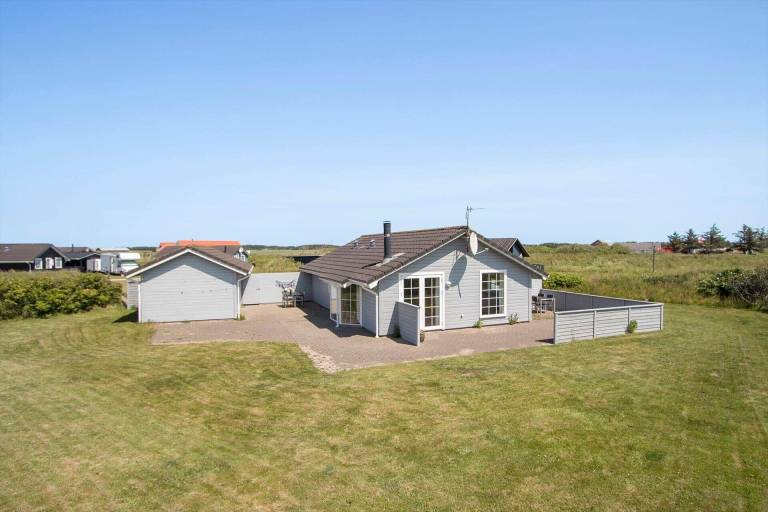 House with barbecue, sauna & terrace in Lokken