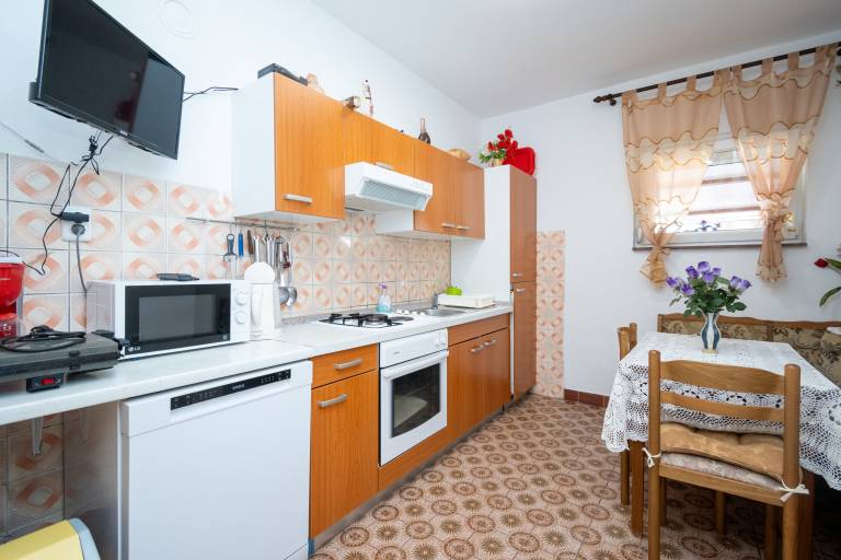 Two bedroom apartment with terrace and sea view Kampor, Rab (A-5056-a) — photo 5