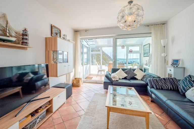 Ferienhaus mit Wasserblick, Terrasse und Wintergarten — photo 4