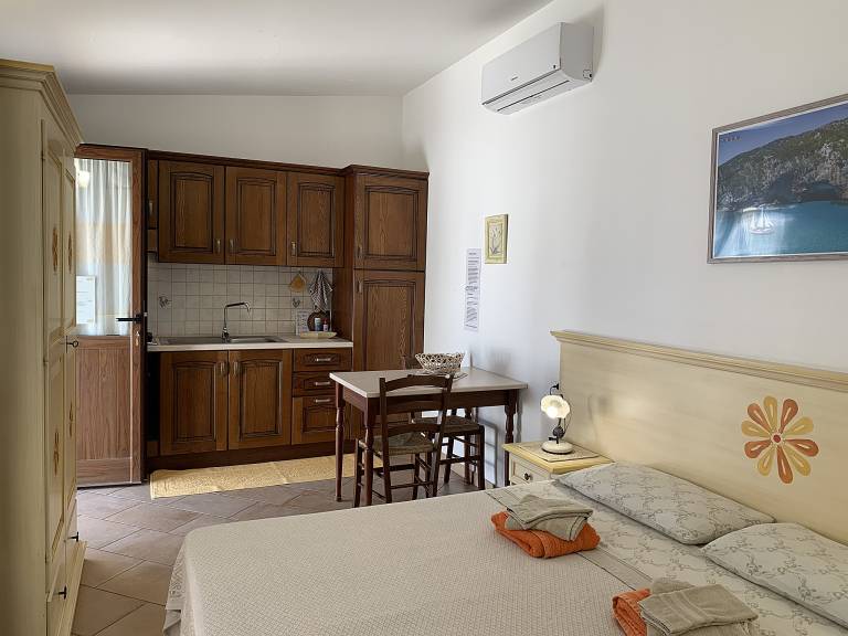 Agriturismo Vistamare: Camera quadrupla familiare con cucina — photo 3