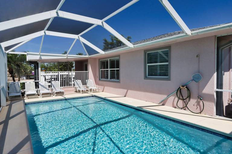 Updated Three Bedroom Cottage, Short walk to the Beach! Shell Basket 1 in Sanibel, FL