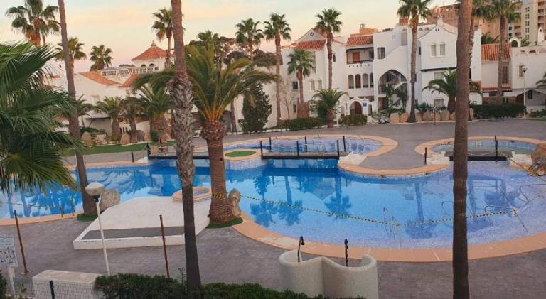 Holiday apartment with garden, terrace & private pool in Roquetas de Mar
