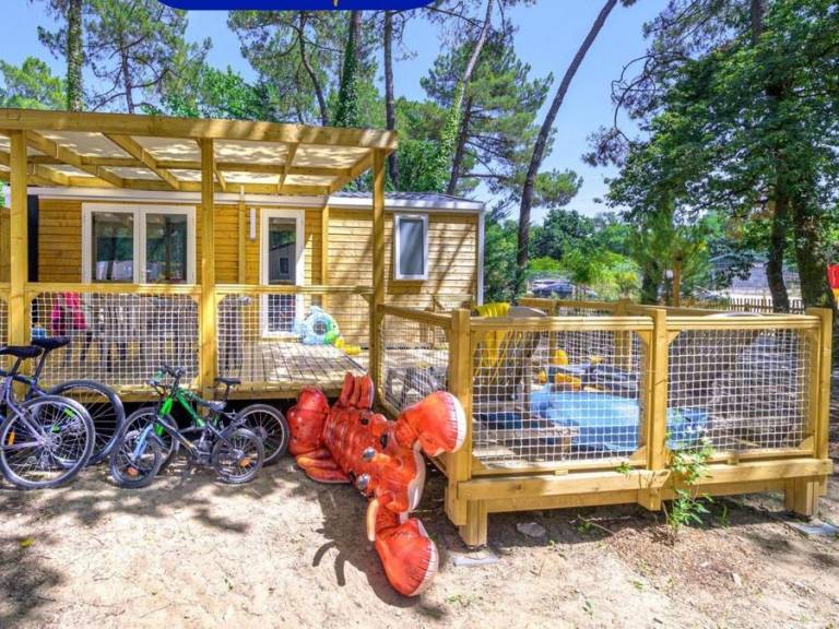 Mobile home with terrace, heated pool & grill — photo 4