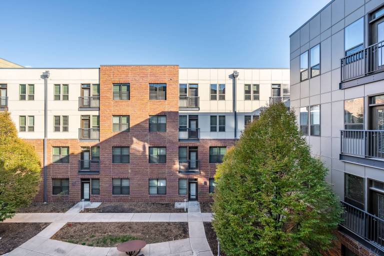 Downtown corner unit with free parking