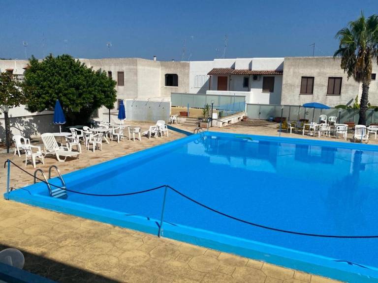 Villa with pool, garden & patio | Garden view in Porto Cesareo
