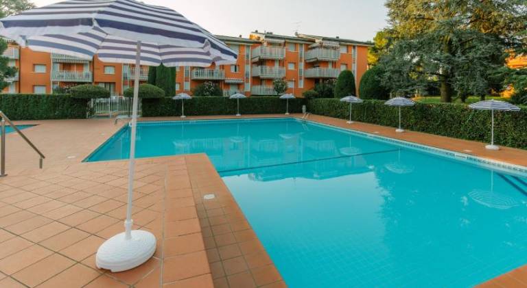 Rental apartment with patio, yard & pool — photo 2