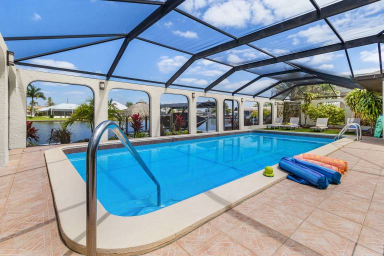 Riverfront Escape with Pool, Tiki Hut & Gulf Access Fun - Villa Kai Malie - Roelens in Cape Coral, FL