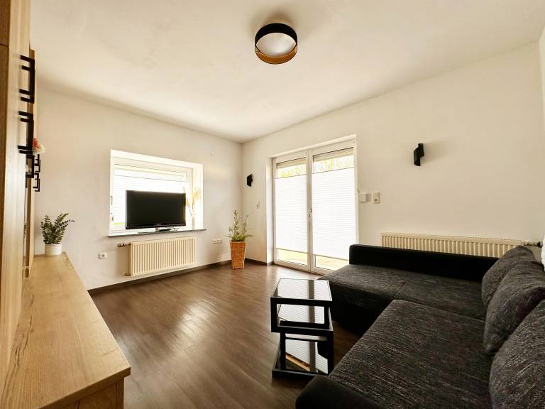 Holiday apartment with patio | Garden view — photo 3