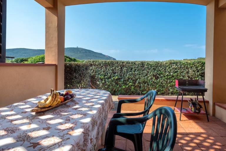Holiday Home "Pergola 706" Steps from the Beach with A/C and Private Terrace in Stintino