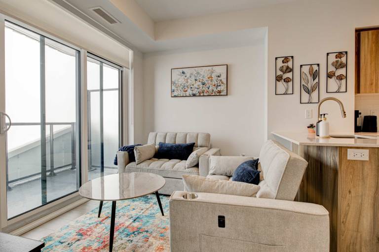 Modern High Rise Condo w City Views & Balcony