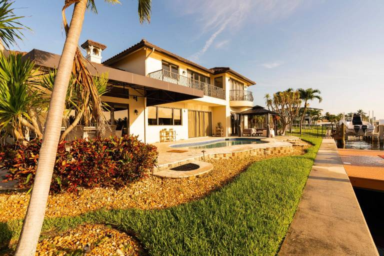 Vacation home with yard, grill & private pool in Deerfield Beach, FL