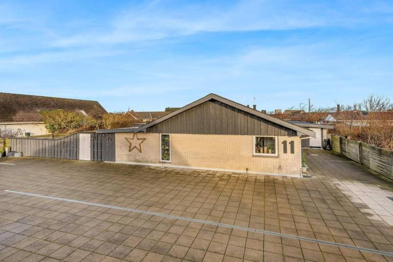 Vacation home with sauna & yard in Lokken